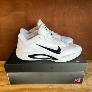 Nike White Low-Top Sneakers with Black Swoosh